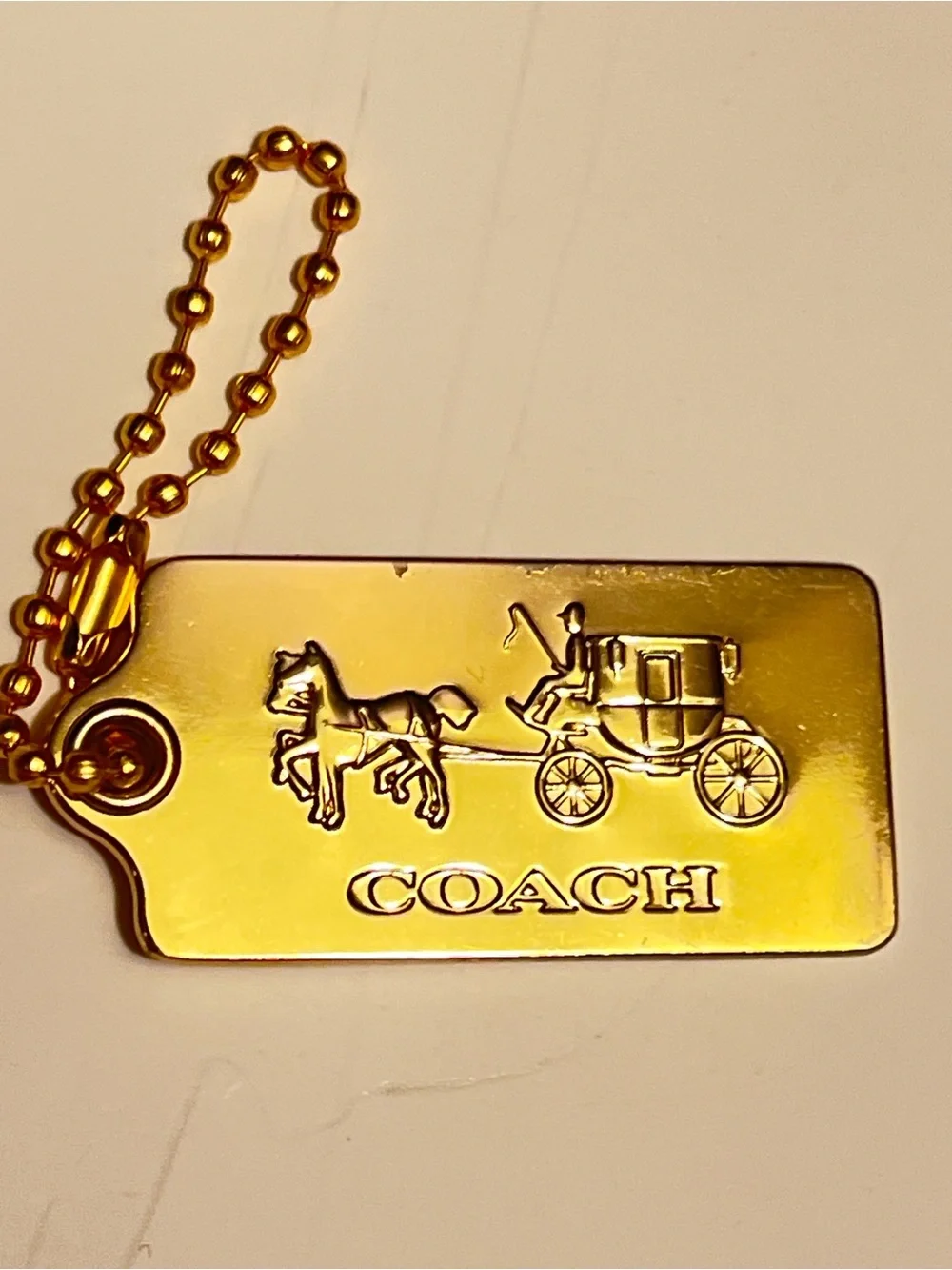 Very Rare Vintage Coach Gold Horse & Carriage Tag Key Holder and bag charm.
